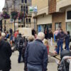 A crowd listening to Alan Jenner preach in Truro