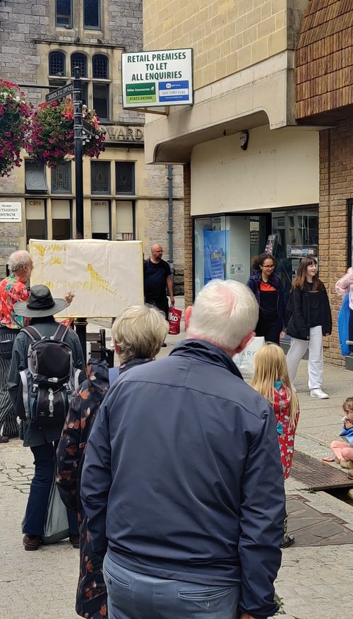 A crowd listening to Alan Jenner preach in Truro