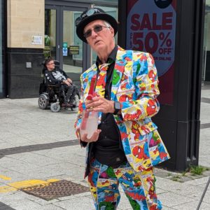 Steve Gurnett holding a chemical cross