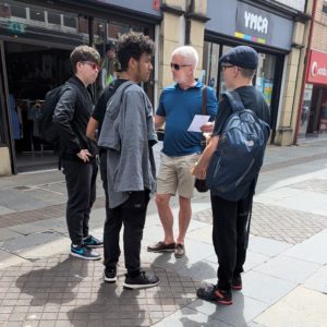 Gordon speaking to a group of people