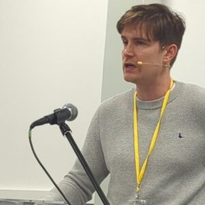 Owen Batstone speaking at the Evangelists Conference 2025