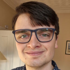 a headshot of Ben Warne
