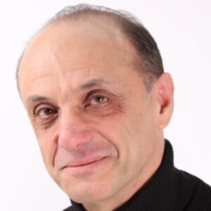 a headshot of Paul Alkazraji
